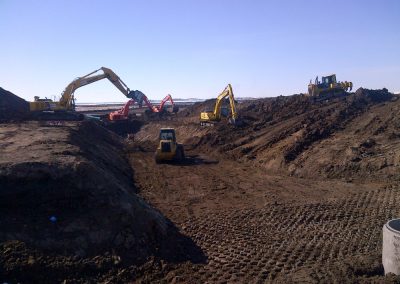 M.A.P. Excavators & Cats Digging Trenches
